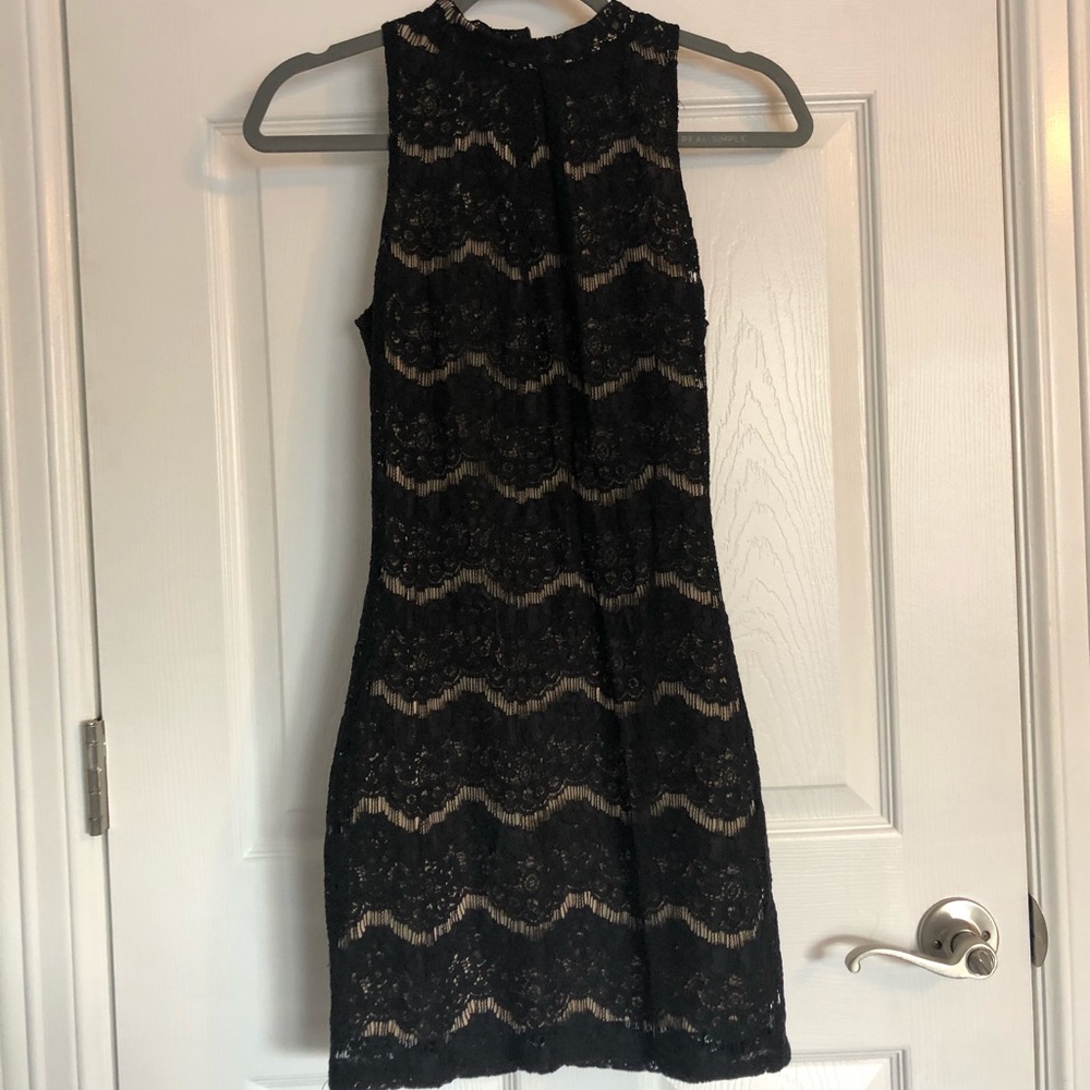 Tight black lace dress